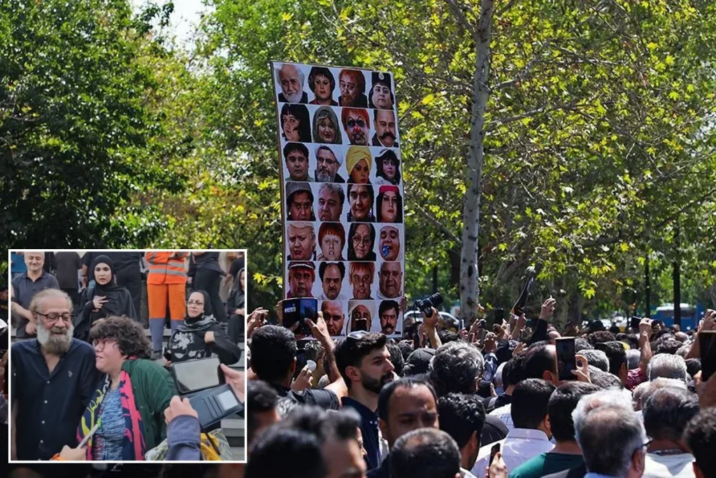 سلفی‌های بی‌پایان یک زن با هنرمندان در مراسم تدفین اکبر عبدی